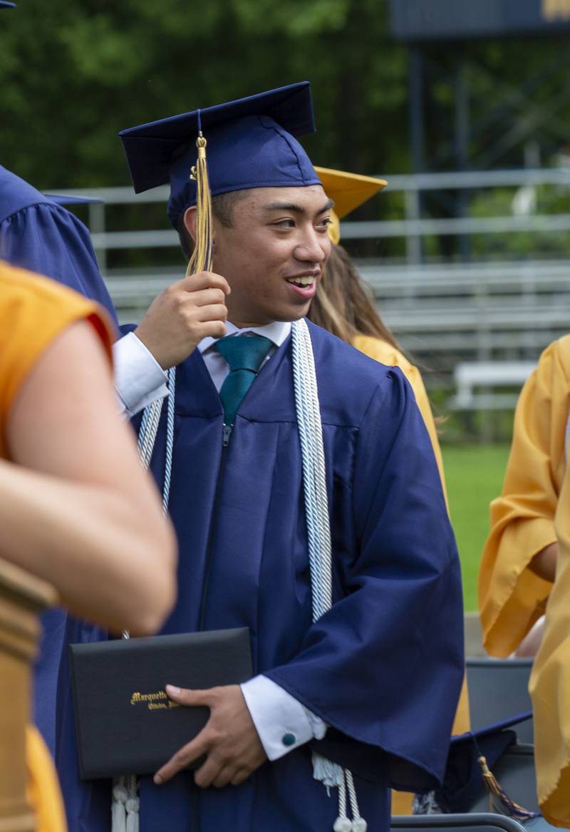 Benjaman Weyer moves his tassel Sunday, May 29, 2022, during the graduation ceremony at Marquette Academy High School.
