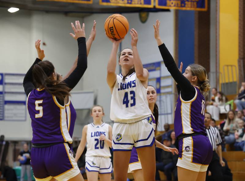 Lyons' Emma O'Brien (43) puts up a shot during the girls varsity basketball game between Downers Grove North and Lyons Township on Saturday, Jan. 11, 2025 in La Grange.