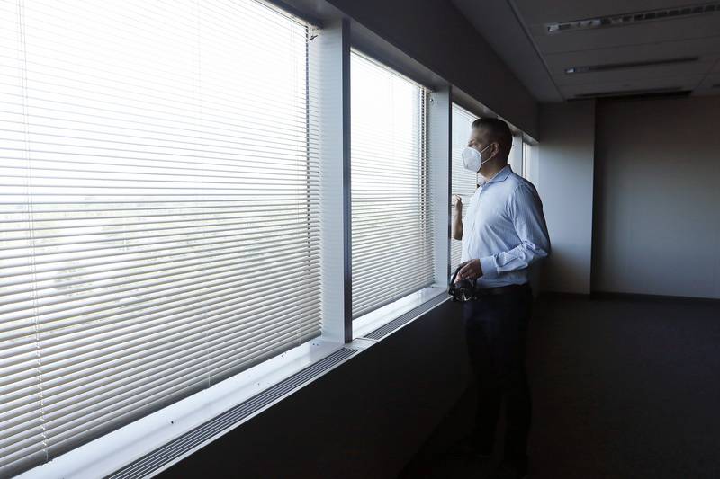 Green Data Center Real Estate Inc. CEO Jason Bak looks out of a corner office on the fourth floor of the property at the former Motorola headquarters on Thursday, June 10, 2021 in Harvard.