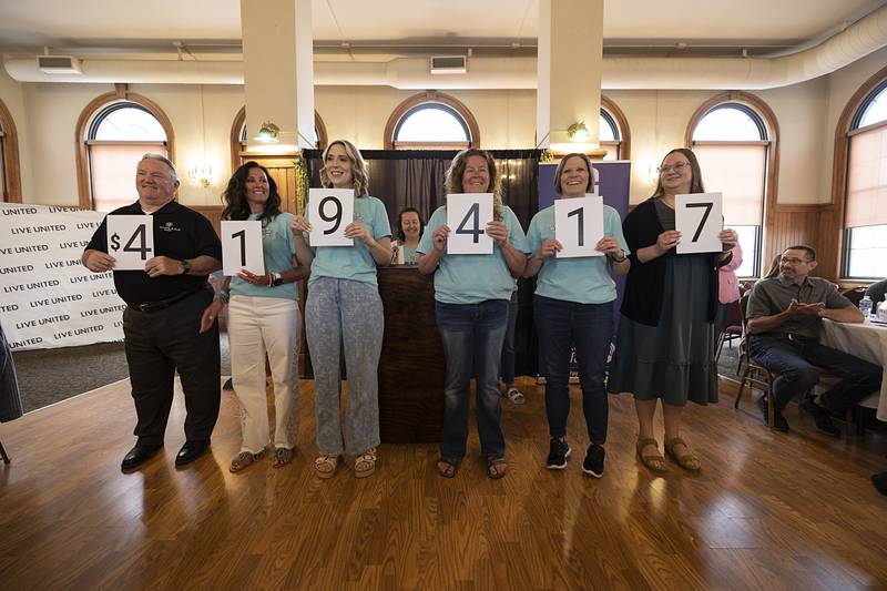 United Way of Lee County board members unveil the campaign results Tuesday, May 12, 2026, at the United Way of Lee County 2025 campaign celebration. A total of $419,417 was raised this year through donations from the community.