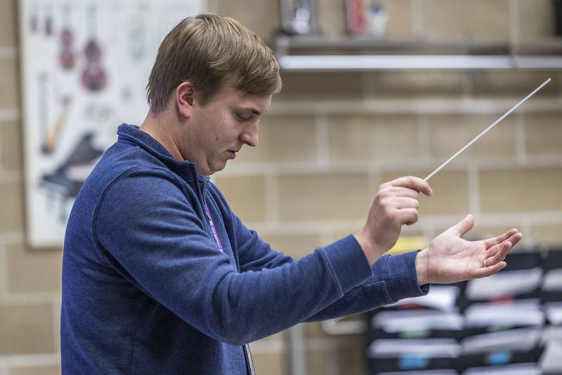 Teacher Christopher Hansen runs his students through band practice Monday, Oct. 20, 2025, at Reagan Middle School.