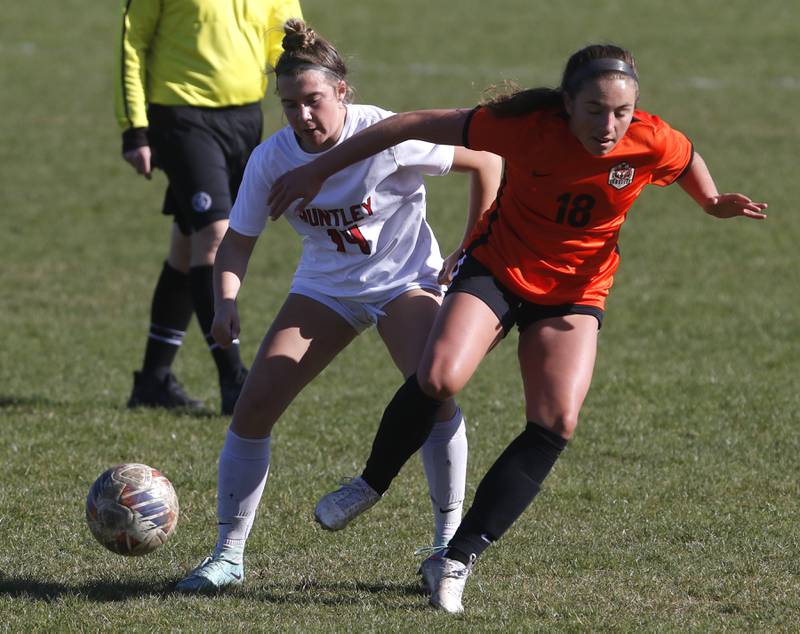 Huntley's Sofia Bruns battles with Crystal Lake Central's Sadie Quinn for control of the ball during a Fox Valley Conference soccer game on Tuesday, April 9, 2024, at Crystal Lake Central High School.