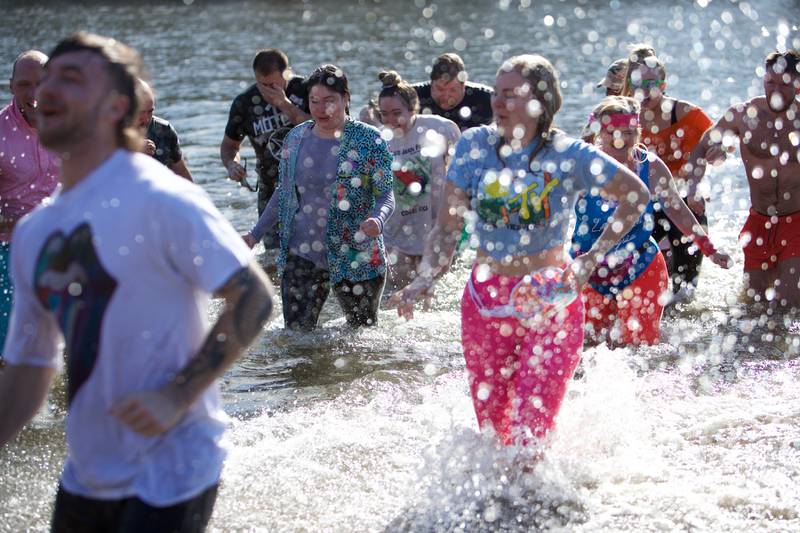 Locals take the plunge at the St. Charles Police and Fire Annual Polar Plunge at Ferson Creek Park on Sunday, March 9,2025 in St. Charles.
