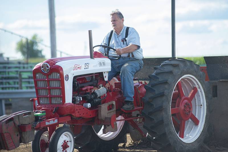 Don Ward chugs through his pull Thursday, July 28, 2022 during the 4750 tractor class pulls at the Lee County 4H fair.