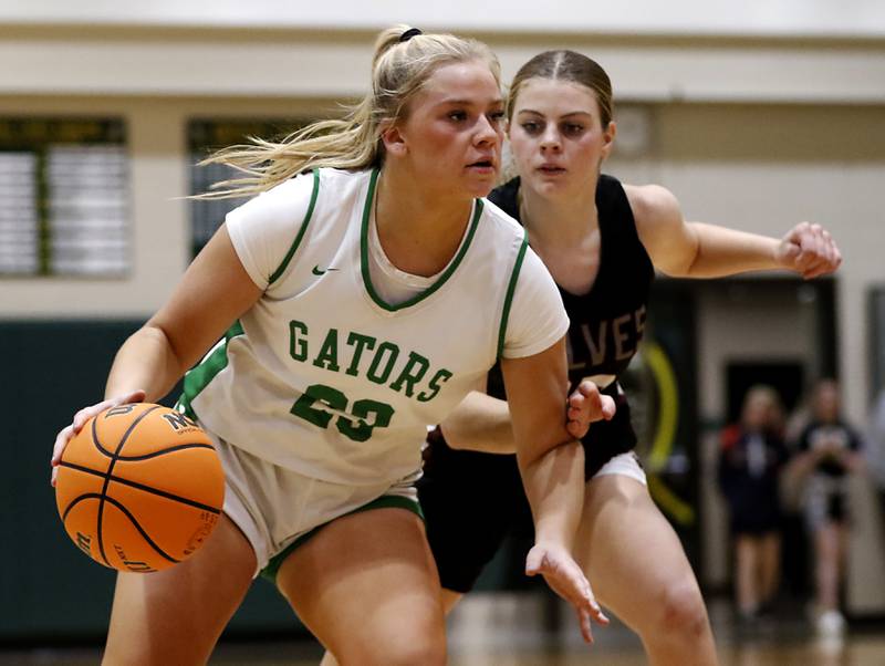 Crystal Lake South's Laken Lepage brings the ball up the court against Prairie Ridge's Bella Militello during a Fox Valley Conference girls basketball game on Friday, Dec. 13, 2024, at Crystal Lake South High School.