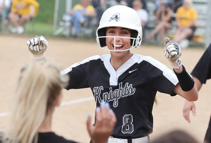 Kaneland's Jenna Harper celebrates after scoring a run Tuesday, May 31, 2022, during their Class 3A Sectional semifinal game against Sterling at Sycamore High School.