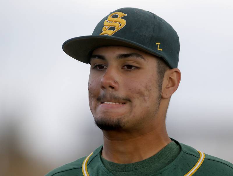 Crystal Lake South pitcher Yandel Ramirez reacts as he leaves the game uring a Fox Valley Conference baseball game against Burlington Central on Friday, April 12, 2024, at Burlington Central High School.