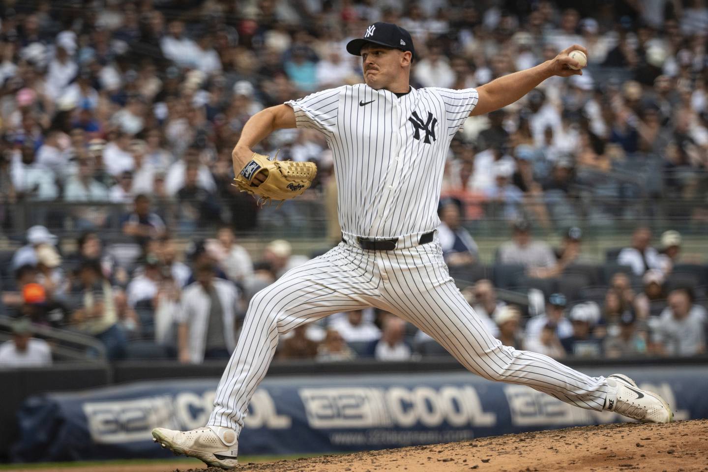 New York Yankees pitcher Brent Headrick throws during the seventh inning of a baseball game against the Milwaukee Brewers, Saturday, March 29, 2025, in New York. (AP Photo/Angelina Katsanis)