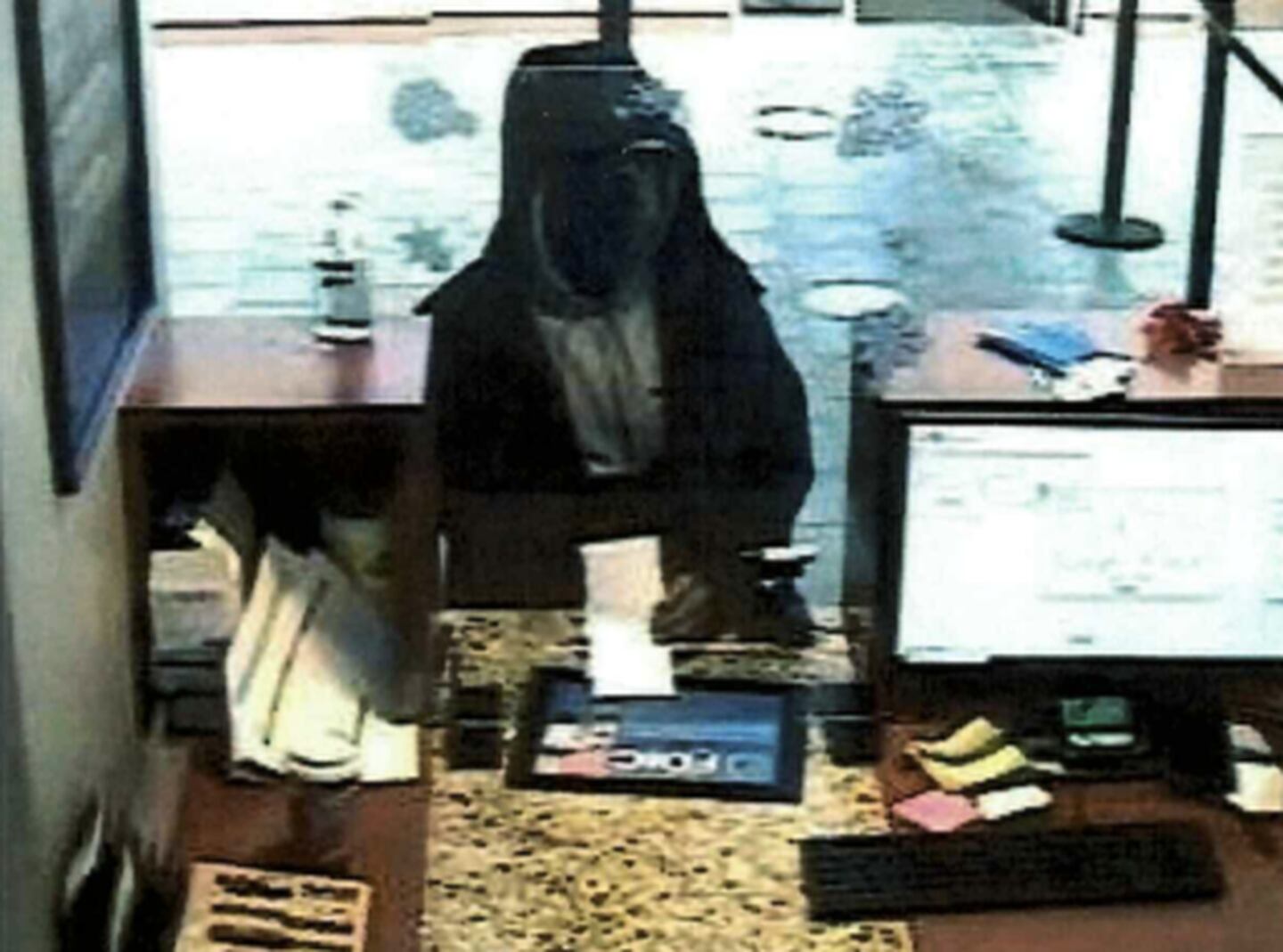 Video surveillance of a suspect who was accused of robbing BMO Harris Bank in Homewood. Antonio Collins, of North Riverside, was later federally charged with the robbery.