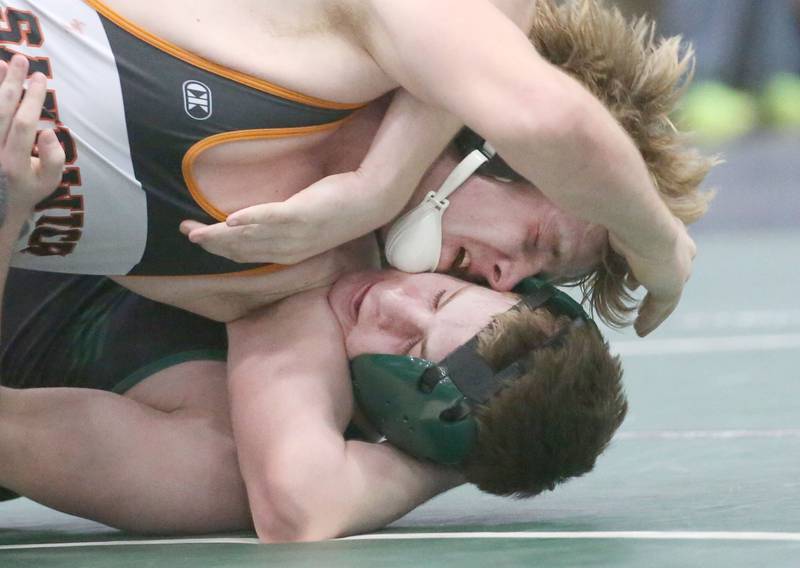 Sandwich's Kaden Clevenger wrestles St. Bede's Garrett Connelly in the 190 pound weight class during the Class 1A Regional meet on Saturday, Feb. 8, 2025 at St. Bede Academy.