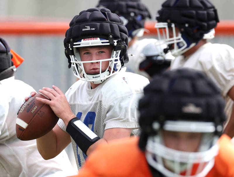 Genoa-Kingston’s Cody Cravatta looks for a receiver Tuesday, Aug. 19, 2025, during practice at the school.