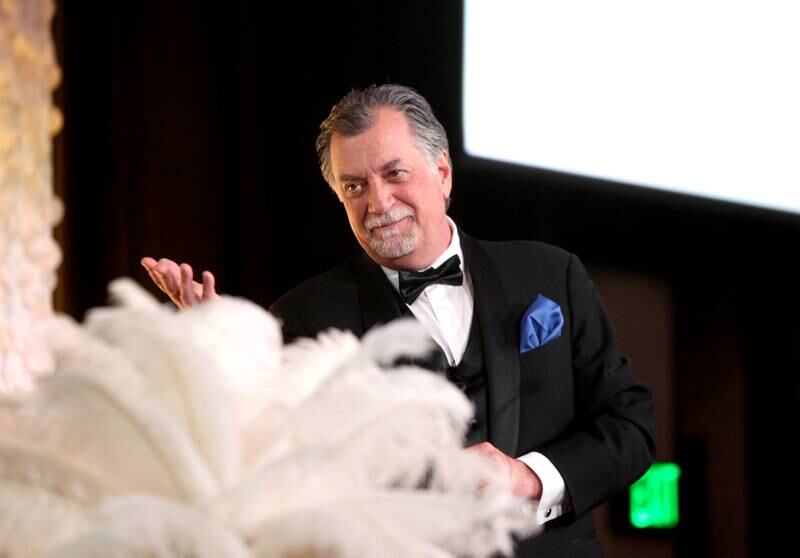 Christopher Schejbal serves as the emcee for the 100th Annual Charlemagne Gala at the Q Center in St. Charles on Friday, May 13, 2022.