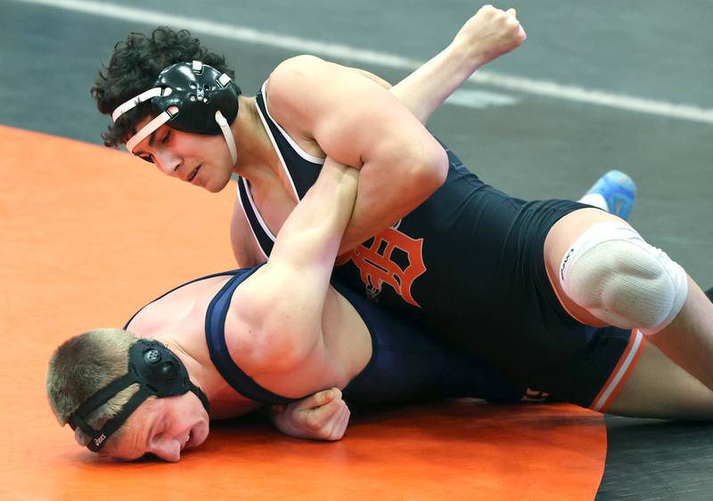 DeKalb’s Jacob Luce controls the match with Naperville North’s Nick Oblazny in their 152 pound semifinal Friday, Jan. 20, 2023, during the DuPage Valley Conference wrestling tournament at DeKalb High School.
