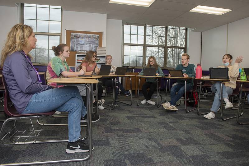 The Dixon High School publications class talks about current events Friday, April 22, 2022. Instructor Michelle Bally (left), Ashlyn Neville, Arielle Rockwood, Autumn Swift, Grace Ferguson, Carson Faley and Emiah Diaz are seen in discussion.