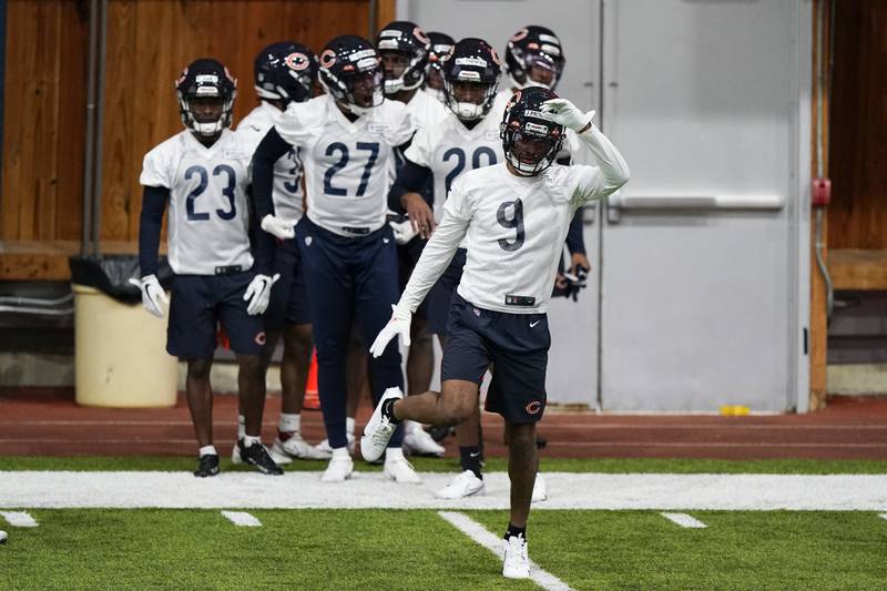 Chicago Bears safety Jaquan Brisker warms up with teammates during the team's rookie minicamp, Friday, May 6, 2022, at Halas Hall in Lake Forest.