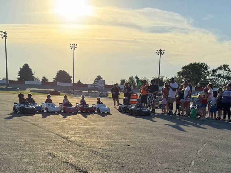 Cheryl Hryn's Racing for Kids hosts its annual Power Wheels Racing on the track at the Grundy County Speedway. Here, the kids lineup waiting for the green flag on Thursday, July 3, 2025.