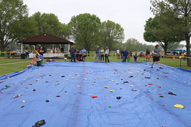 Kids practice casting during the twenty-third annual Kids Fishing Expo on Saturday, May 13, 2023 at Baker Lake in Peru.