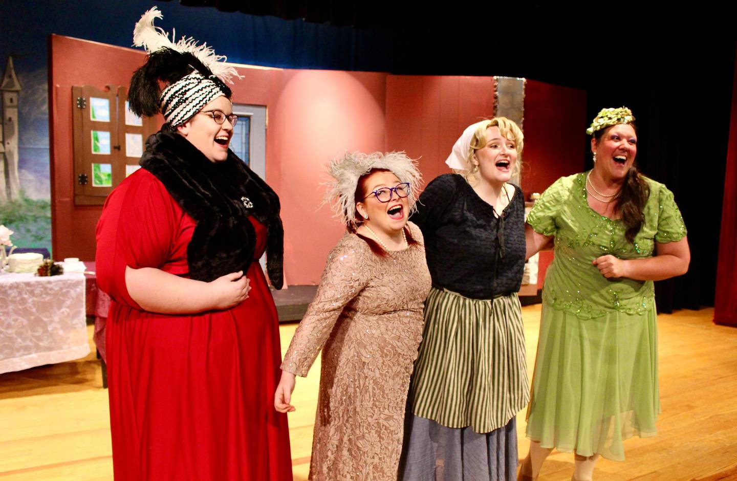 Cinderella's stepmother played by Kim Freeman; stepsister Joy played by Cheyanne Sunken; Cinderella played by Alexis Trammel and stepsister Portia played by Becky Kpa sing about "A Lovely Night" during a rehearsal for Engle Lane's performance of "Cinderella."