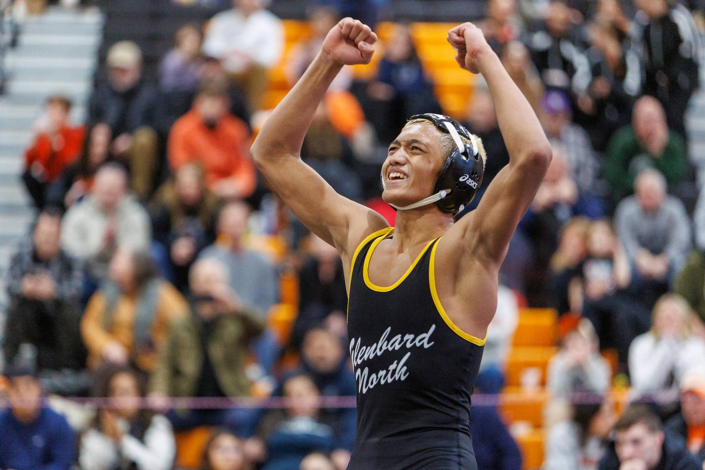Glenbard North's Vannak Khiev celebrates winning the 126 lb Championship match at theSt. Charles East Class 3A Regional on Saturday, Jan. 31,2026 in St. Charles.