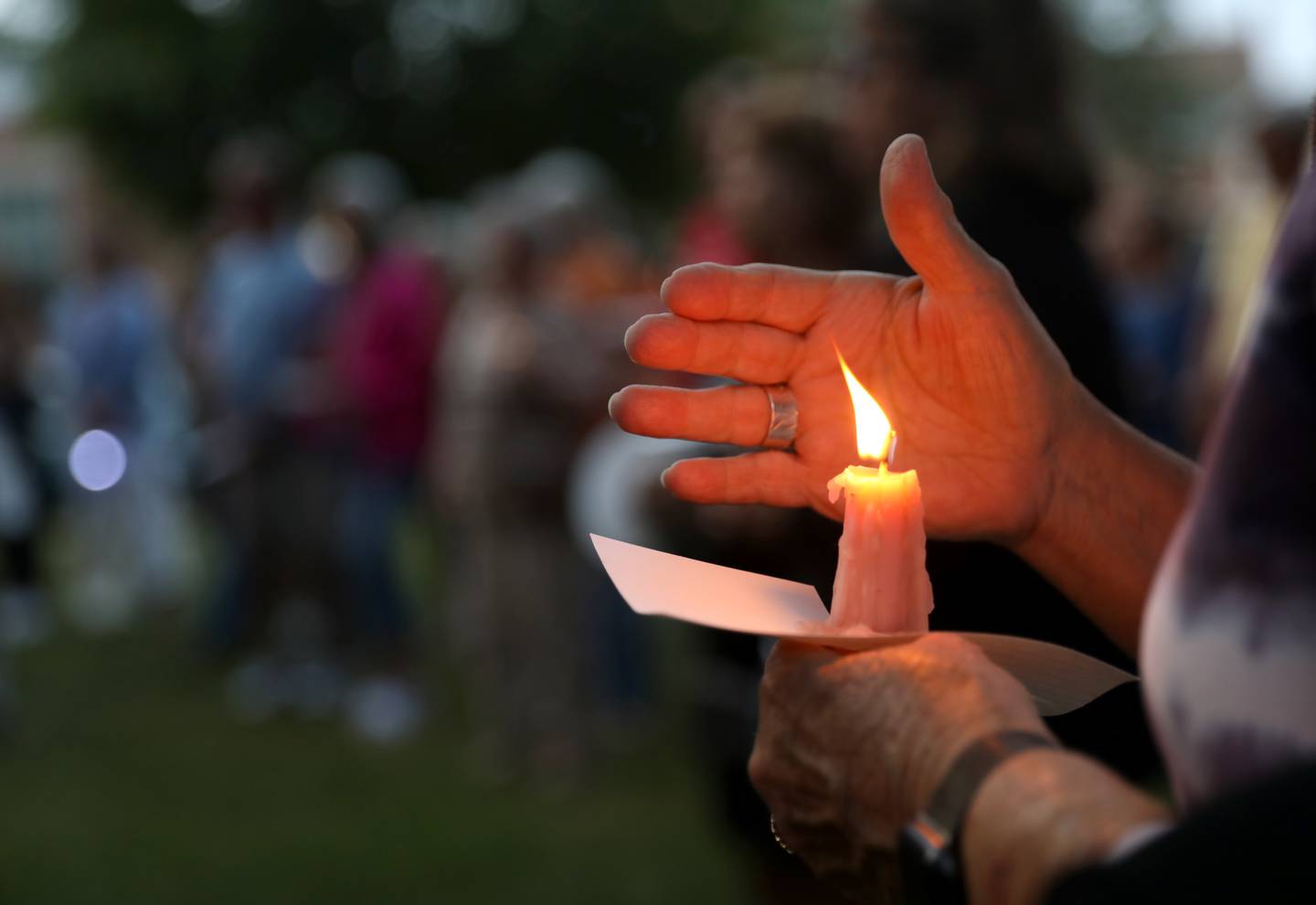 A candlelight vigil was held Wednesday, July 6, 2022, at the Kane County Courthouse in Geneva. The vigil was called to join in solidarity in honor of the mass shooting at a Fourth of July parade in Highland Park.