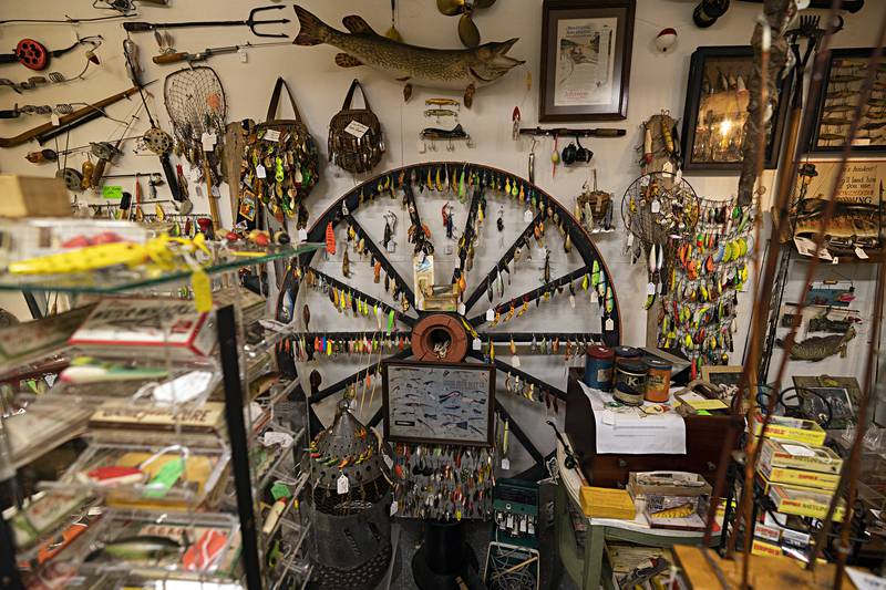 An old wagon wheel makes for an interesting display option. Reap has bought cases from old jewelry stores to showcase his lures in as well.