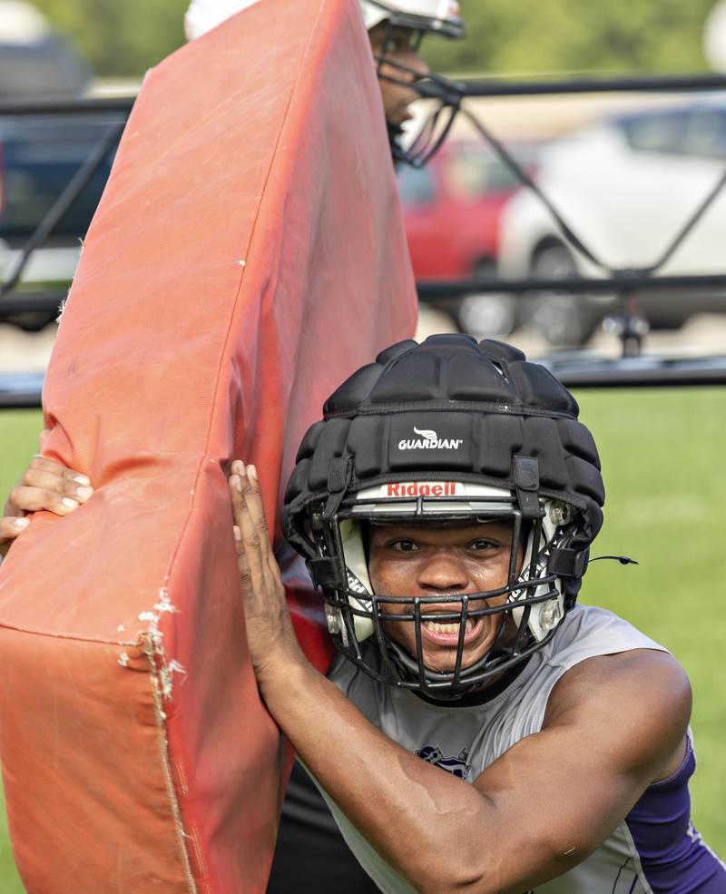 Dixon player Exzavier Diaz runs through tackling drills Monday, August 11, 2025, for the first day of football practice.