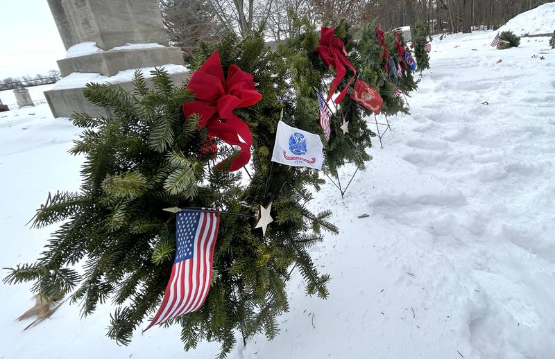 Wreaths representing each branch of the military were placed in front of the Civil War Veteran's Memorial at the Daysville Cemetery at the start of the Wreaths Across America program on Saturday, Dec. 13, 2025.