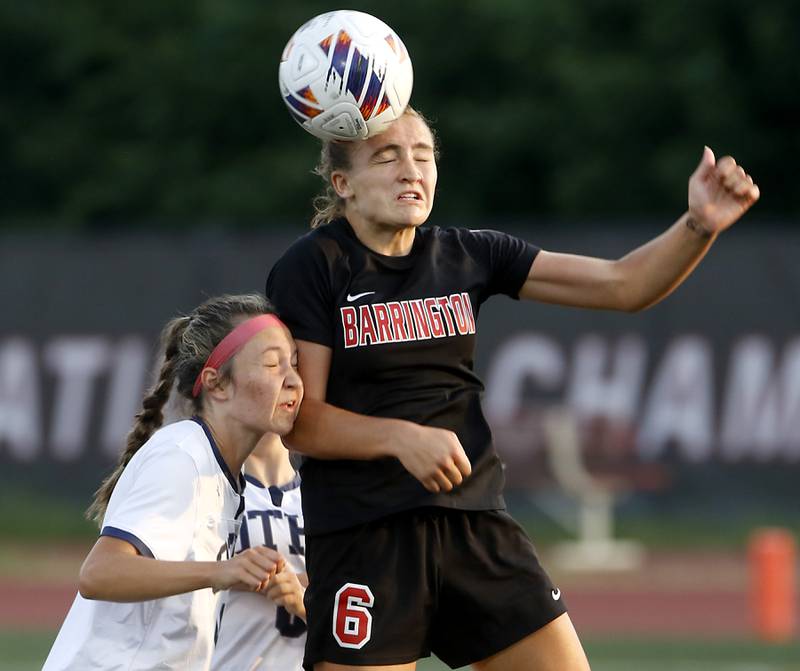 Barrington's Maddy Zierbarth heads the ball in front of O'Fallon's Lyla Twenhafel during the IHSA Class 3A state championship match at North Central College in Naperville on Saturday, June 3, 2023.