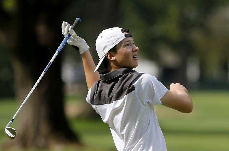 Jacobs’ Barrett Rennell watches his fairway shot on the 17th hole during the Fox Valley Conference Boys Golf Tournament Thursday, Sept. 21, 2023, at McHenry Country Club in McHenry.