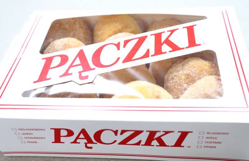 A box of Paczki's are in a display case at the Spring Valley Bakery on Tuesday, Feb. 13, 2024 downtown Spring Valley. A Paczki is a popular Polish-American tradition where bakeries make doughnuts filled with jelly and coated in sugar. The tradition is popular in the Illinois Valley for a Fat Tuesday feast.