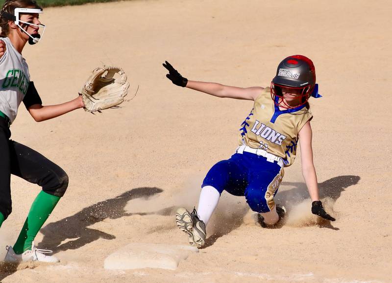 Princeton Logan's Payton Brandt slides into third base in Thursday's season opener.