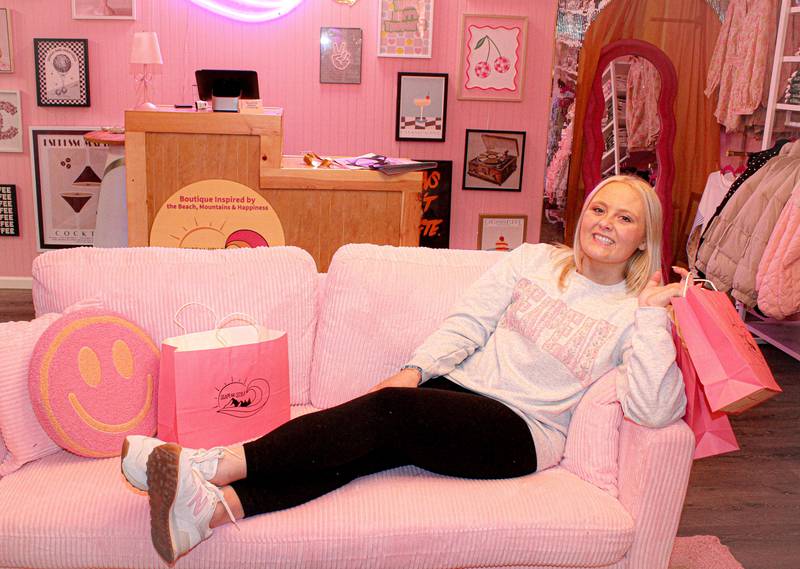 Grace Schultz, owner of Seapeak Style in
Batavia, sells a variety of graphic tees and shirts plus accessories to help clients build a wardrobe of statement pieces.