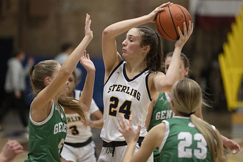 Sterling’s Madison Austin looks to pass against Geneseo Thursday, Dec. 7, 2023 at Sterling High School.
