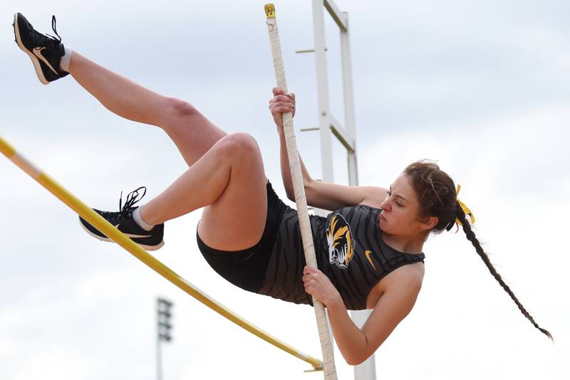 Herscher's Brandi Palmateer gets over the bar in the pole vault at the Herscher Invite Friday, May 2, 2025.