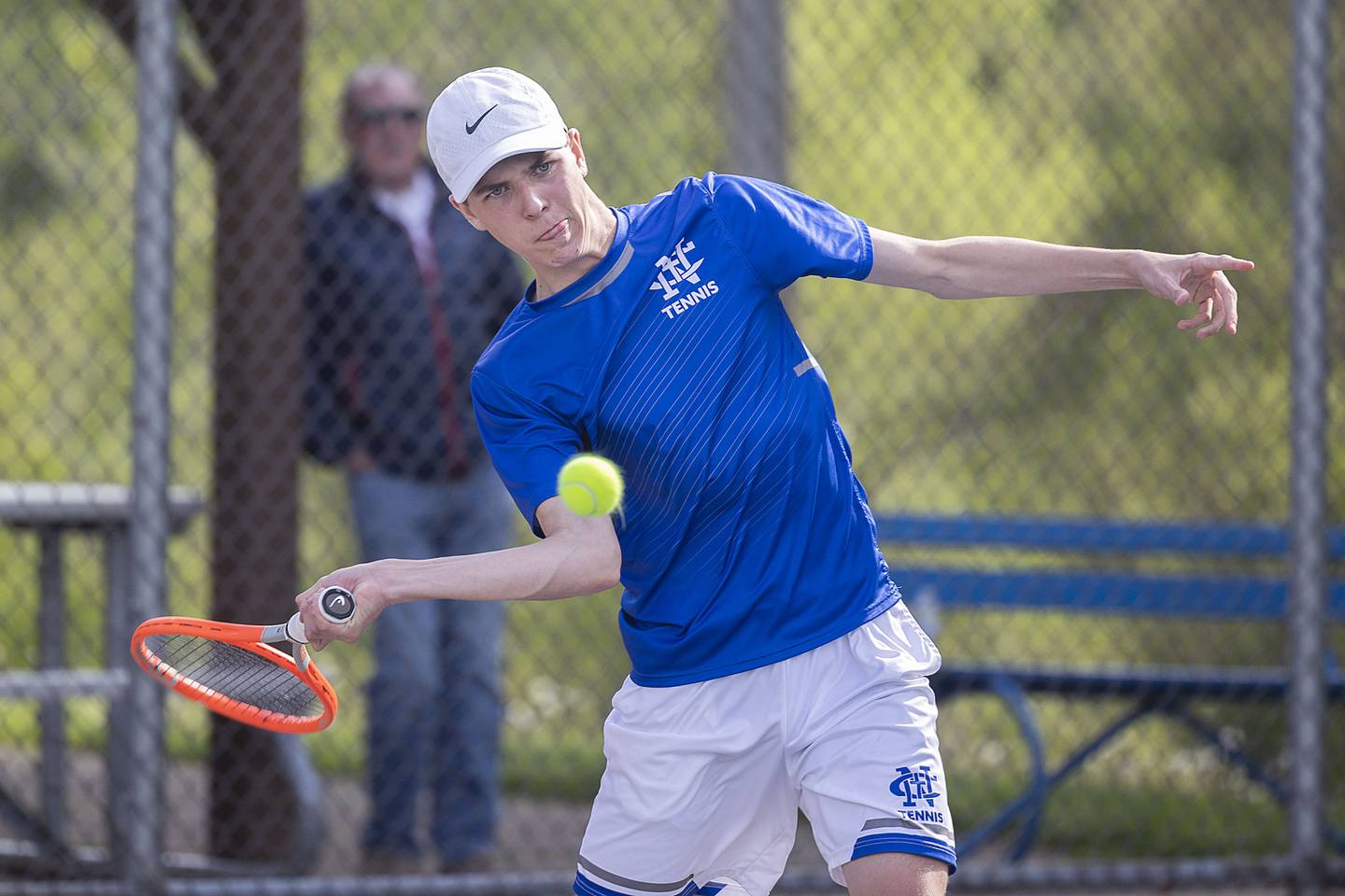 Newman’s Logan Palmer eyes the ball while playing against Dixon’s Damian Beck Tuesday, May 9, 2023.