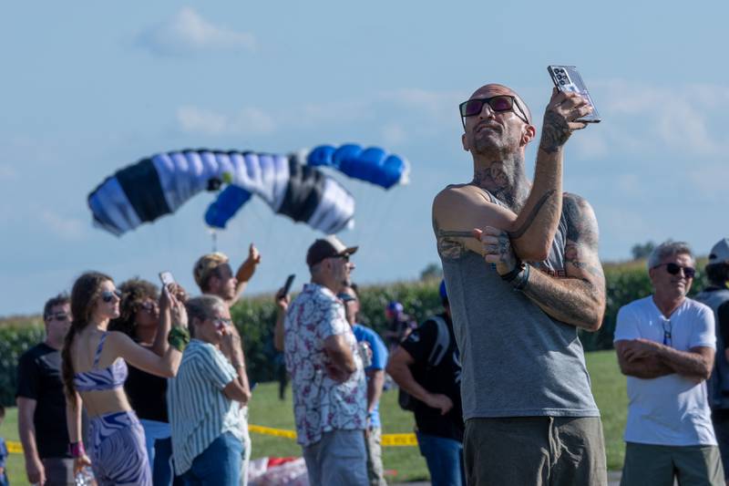 Juan Leg records as Skydivers glide towards drop zone on Friday, Aug 22, 2025 above Skydive Chicago in Ottawa.