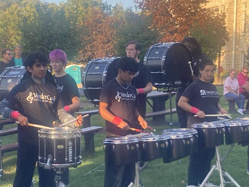 Members of the VanderCook Music School drum line perform at the Let's Beat Breast Cancer rally in Lockport's Central Square. 
Thursday, Oct. 16, 2025.