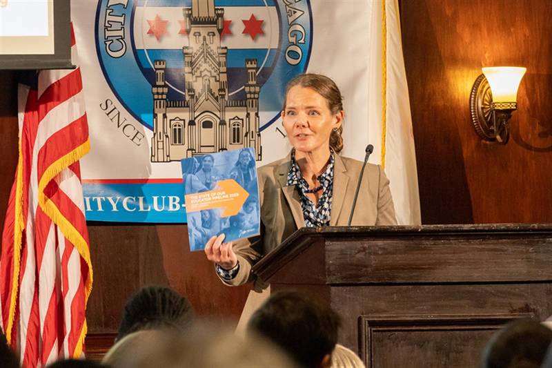 Ann Whalen, director of policy for Advance Illinois, speaks to the crowd at the City Club of Chicago about her organization's recently released report on the education workforce in Illinois.