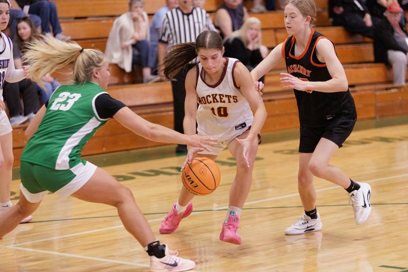 Richmond Burton's Daniella Mazzola looks to keep control of the ball against Crystal Lake South's Laken LePage at the McHenry County Area All Star Basketball Extravaganza on Sunday April 12 in Hebron.