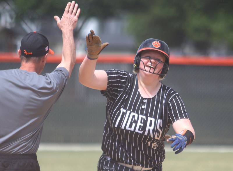Crystal Lake Central’s Logan Grams rounds third base after belting a seventh-inning home run against Woodstock North in IHSA Class 3A Regional Title Game softball action on Saturday, May 23, 2026 at Crystal Lake Central High School in Crystal Lake.