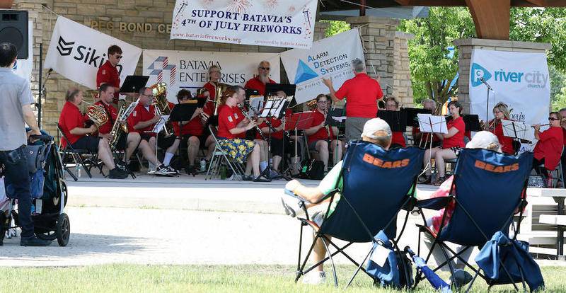 The Batavia Community Band performs during a Flag Day observance at the Batavia Riverwalk on June 11. (Jeff Krage for Shaw Media)