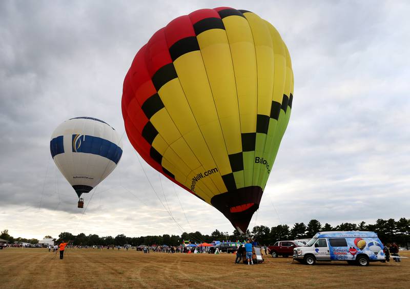 Hot air balloons begin to launch at Zearing Park during the 52nd annual Homestead Festival on Friday, Sept. 8, 2023 in Princeton.