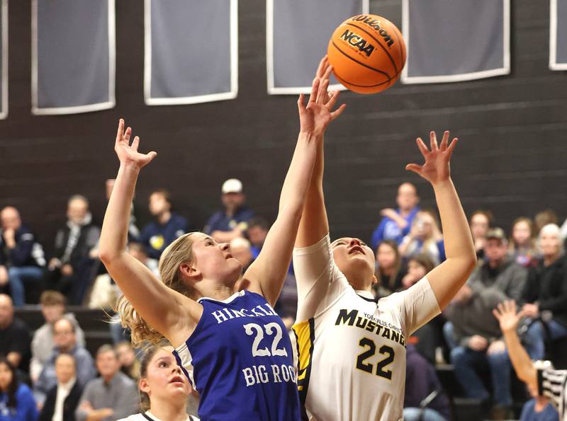 Hinckley-Big Rock's Anna Hermann and Yorkville Christian's Danielle Bulson go after a rebound during their Class 1A regional game Tuesday, Feb. 17, 2025, at Indian Creek High School in Shabbona.