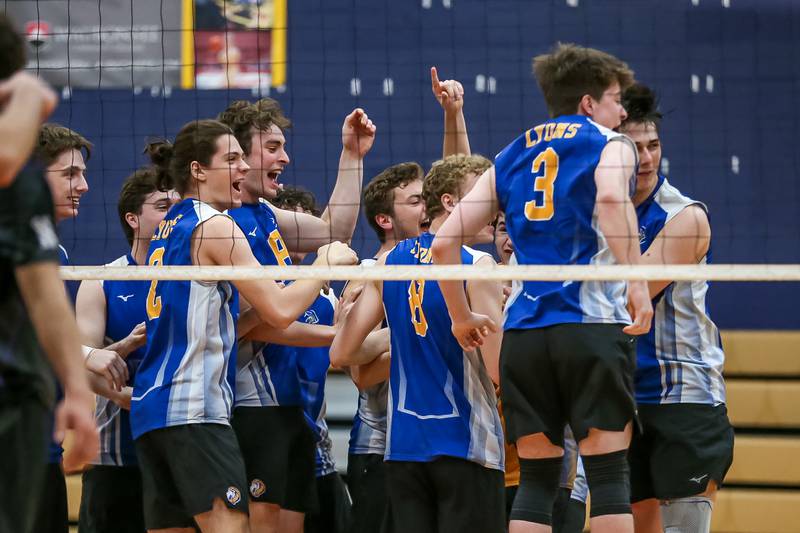 Lyons celebrates the victory over Downers Grove North in their Oswego Sectional final match on Tuesday, May 30, 2023.