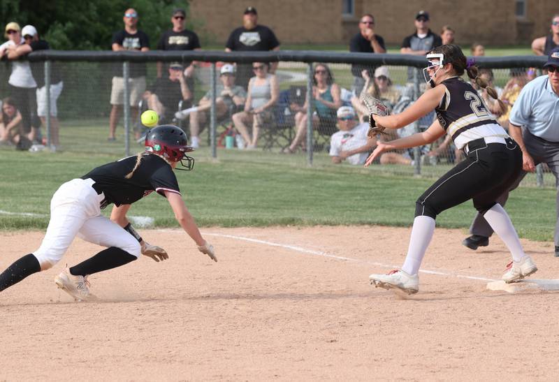 Antioch's Grace Green is doubled off of first as Sycamore's Kaitlyn Williams waits for the throw during their Class 3A supersectional Monday, June 3, 2024, at Kaneland High School in Maple Park.