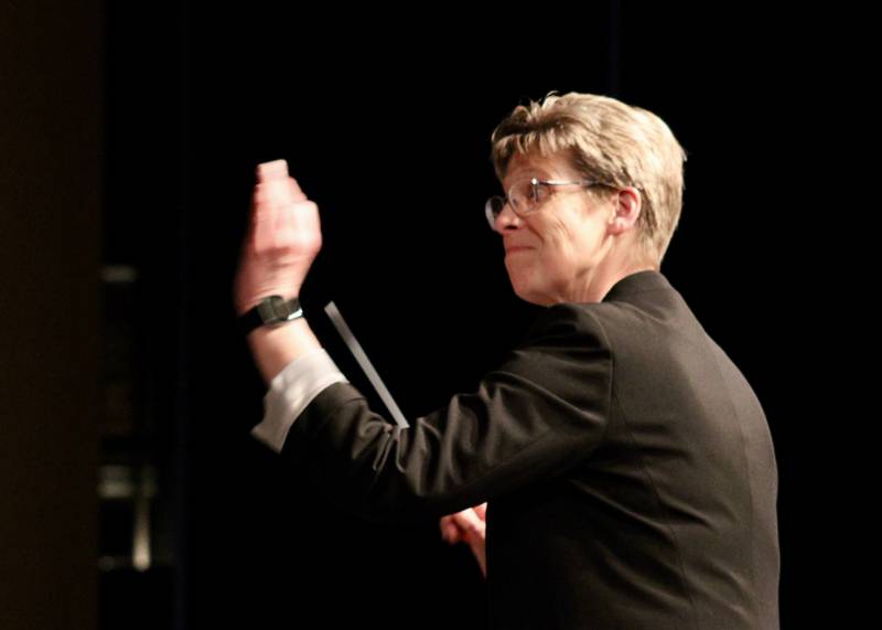 Annette Hackbarth, director of bands at Dakota schools, serves as conductor for the Sterling Municipal Band's Spring Concert on Wednesday at Centennial Auditorium.