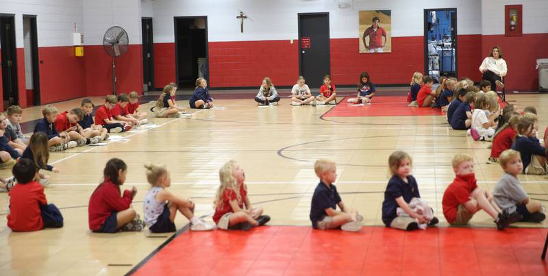 Students pray and recite the Rosary during the Praying the Rosary campaign on Tuesday, Oct. 7, 2025 at Academy of St. Carlo Acutis Oglesby campus.