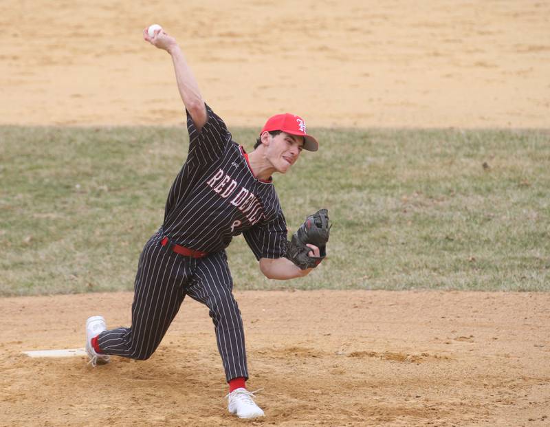 Hall pitcher Brayden Curran lets go of a throw to Streator on Tuesday, March 18, 2025 in Foley Field at Kirby Park in Spring Valley.