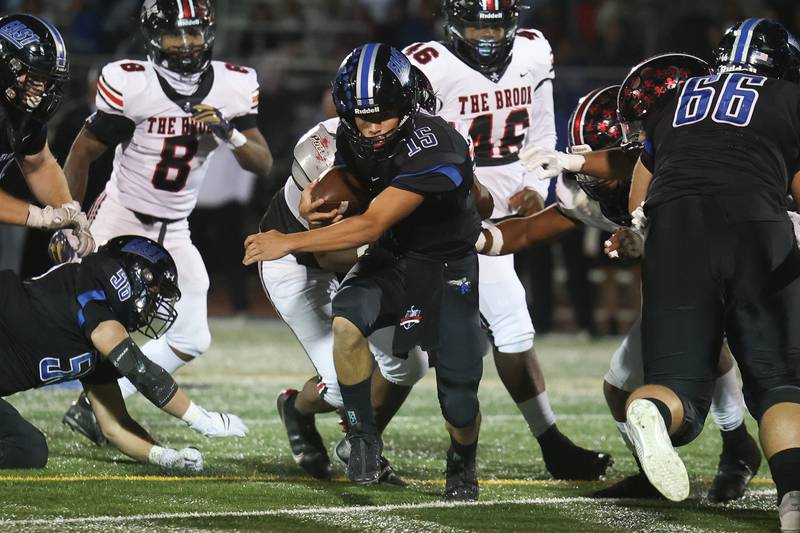 Lincoln-Way East’s Braden Tischer rushes against Bolingbrook. Friday, Sept. 23, 2022, in Frankfort.