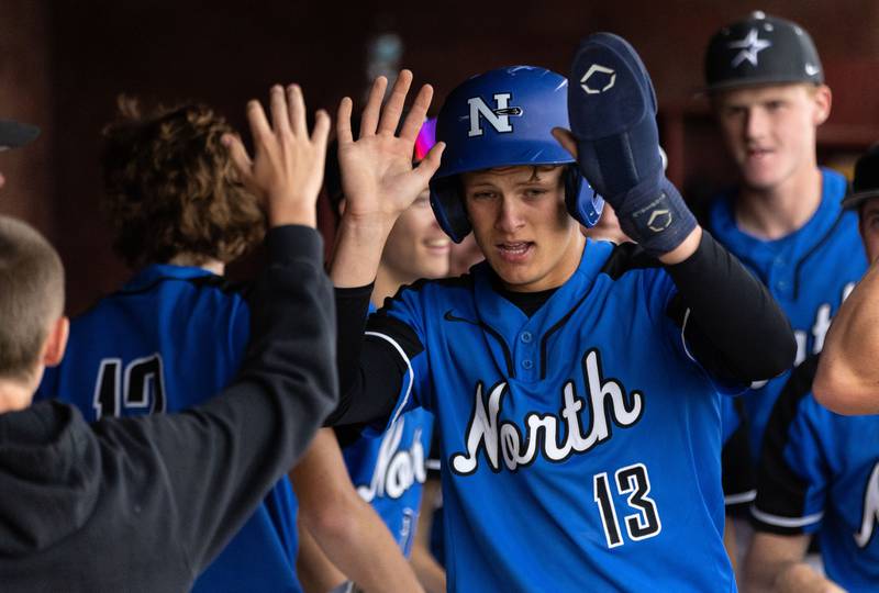 St. Charles North pitcher Matt Ritchie celebrates after he scored a run against Batavia during the Class 4A Regional semifinal at Batavia High School in Batavia on Thursday, May 29, 2025.